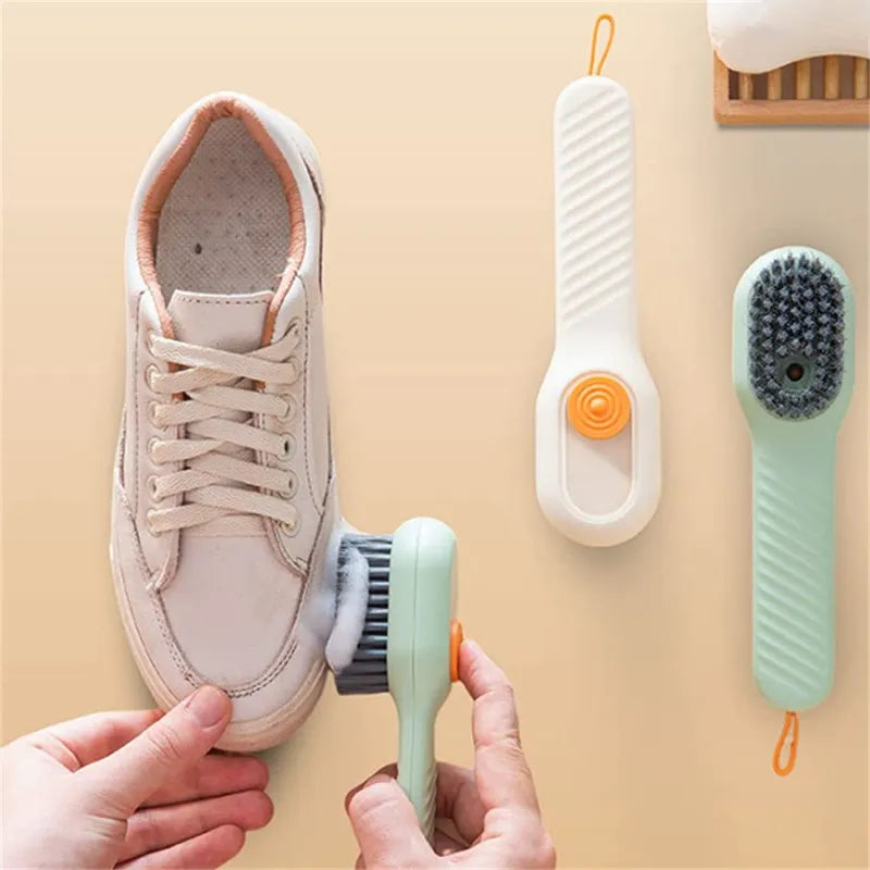 Shoe cleaning brush with soap dispenser